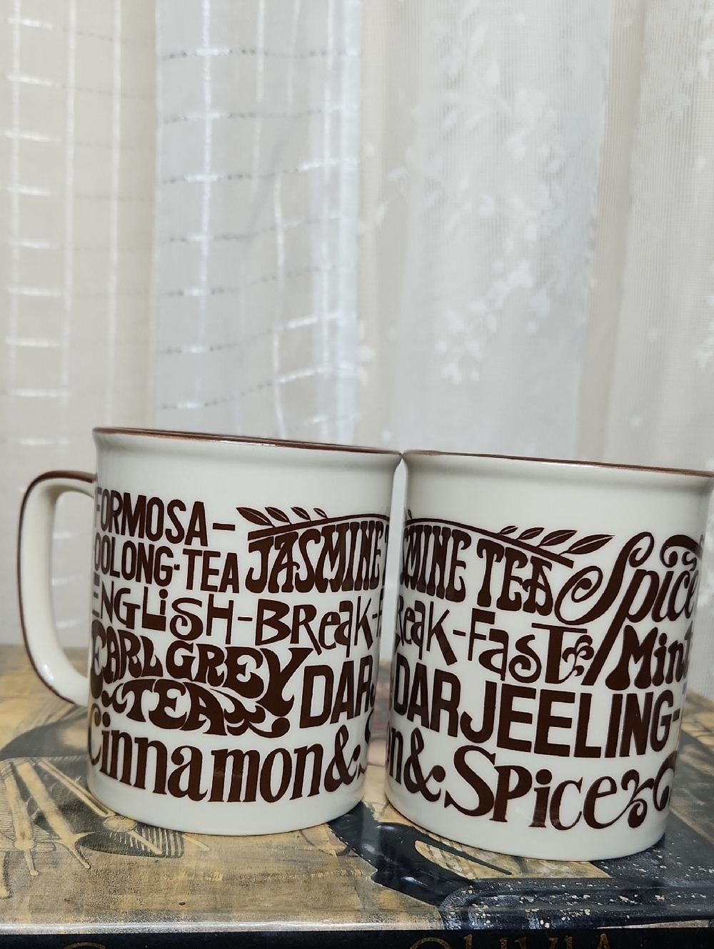 set of vintage 70's mugs decorated with various tea type names in brown Set of 2
